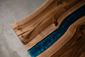 table with blue epoxy and natural wood top view