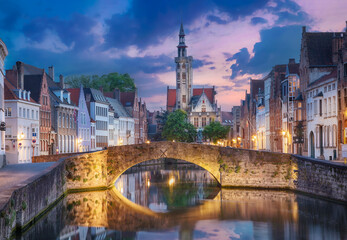 Naklejka premium Bruges or Brugge, Belgium. View of Spiegelrei canal at dusk (HDR image)
