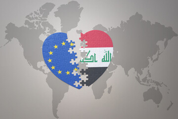 puzzle heart with the national flag of european union and iraq on a world map background. Concept.