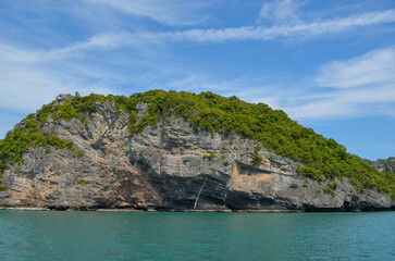 green limestone hill, mountain in the ocean, marine park in Thailand, uninhabited , uninhabited island, wildlife