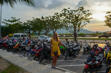 girl in yellow dress with motorbikes 