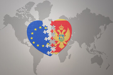 puzzle heart with the national flag of european union and montenegro on a world map background. Concept.