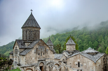 Fototapeta na wymiar Haghartsin monastery complex with foggy background