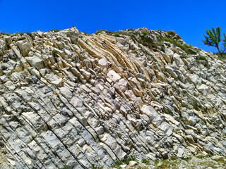 Background slice mountains and blue sky. Bottom view.