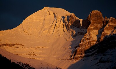 Fototapeta na wymiar Landscape with snow in setting sun
