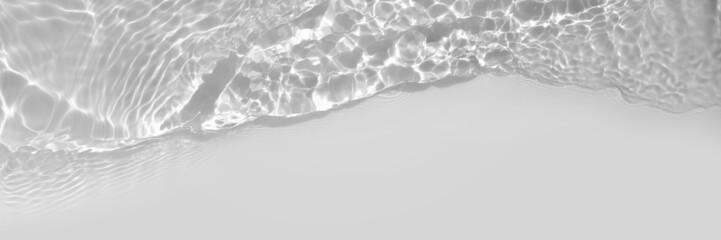 Water texture with sun reflections on the water overlay effect for photo or mockup Organic light...