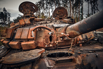 Obraz na płótnie Canvas War in Ukraine blown up enemy equipment near Kyiv