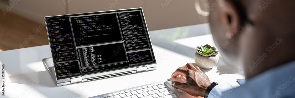 Poster African American Coder Using Computer At Desk