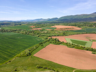 Fototapeta na wymiar Spring Aerial view of rural land near town of Godech, Bulgaria