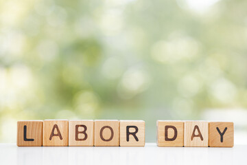 Labor day concept - present, tie on rustic wood background