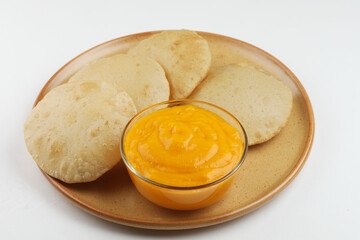 Aam Ras Puri is a delicious Indian recipe served as a seasonal Dessert, Aamras is plain Haapus or...