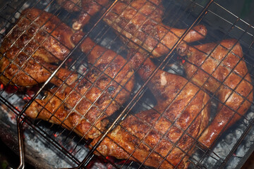 Grilled chicken legs with a golden crust