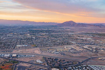 Sunset aerial view of the Frenchman Mountain and cityscape of Las Vegas
