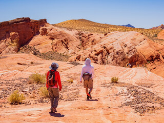 People hiking in the Valley of Fire State Park
