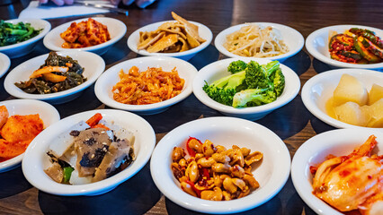 Close up shot of many Korean style appetizer