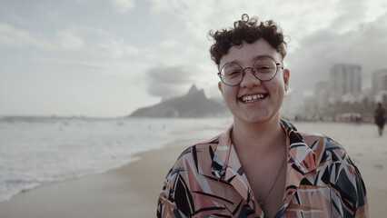 Latin young girl, famous beach Rio de Janeiro, Brazil. Latin summer vacation holiday.