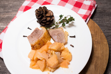 Duck with caramelized pear and pine nuts