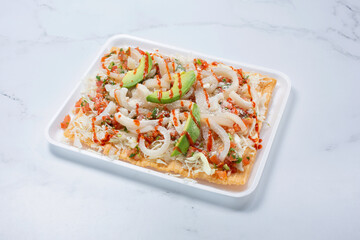 A view of a chicharron avocado salad.