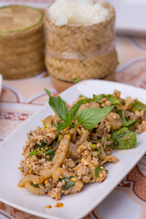 Most of favorite Northeast Thailand food is 
spicy minced pork salad (larb Isan or pork larb)