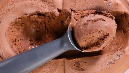 scooping chocolate ice cream