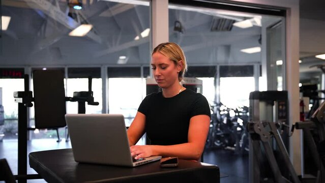 Woman typing on laptop