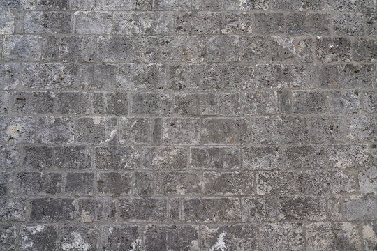brick cinder block stone old grunge plaster facade wallpaper in concrete wall background