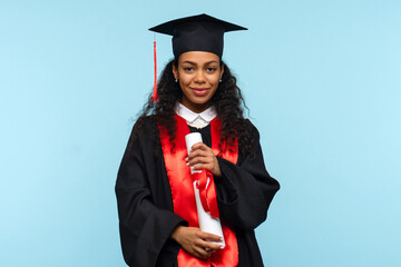 African american woman in graduate dress and mortarboard