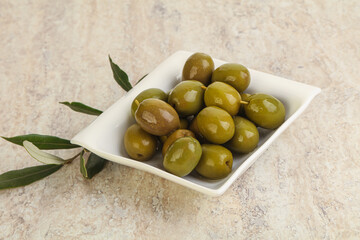 Tasty marinated olives in the bowl