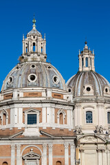 Fototapeta na wymiar Domes of the churches Santa Maria di Loreto and Church of the Most Holy Name of Mary at the Trajan Forum, Rome, Italy