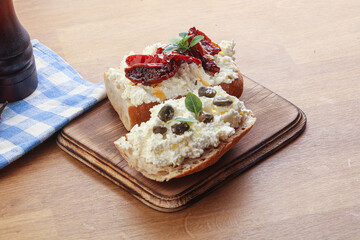 bruschetta with soft cheese capers and tomato