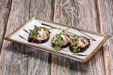 Grilled eggplant slice with sauce