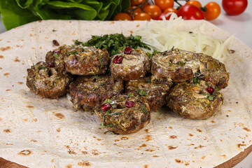 Baked mushroom champignon with sauce