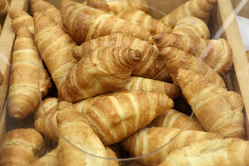 sale of fresh croissants in the store