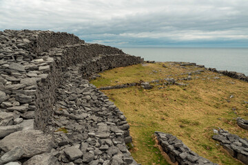 Stunning nature scenery of Aran island, county Galway, Ireland. Dry stone fences and blue cloudy...