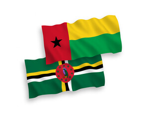 Flags of Dominica and Republic of Guinea Bissau on a white background