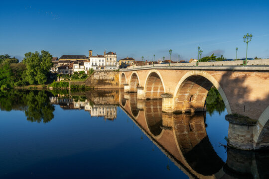 view of the Dordogne River and old stone bridge leading to Bergerac