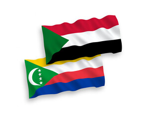 Flags of Union of the Comoros and Sudan on a white background