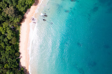 Amazing top view beach Aerial view of Tropical beach sea in the beautiful Phuket island Located at Laem Sing beach Phuket Thailand