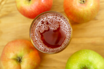 Apple juice close up rotate. Healthy food and drink. Selective focus.