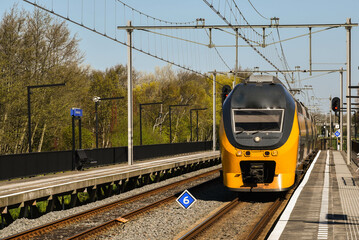 Den Helder, Netherlands, may2022. Passing dutch train on station in Den Helder.