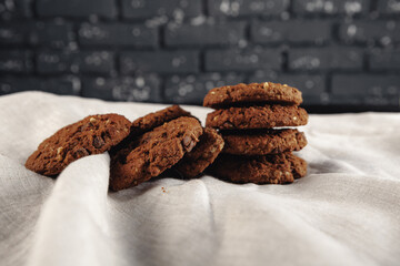 Bunch of oat cookies on table cloth