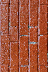 background in the form of brickwork with painted red paint