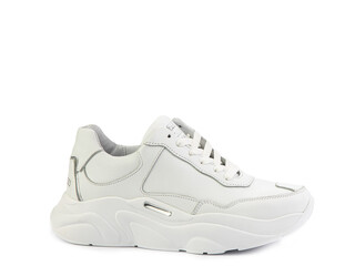 White classic leather trainers. Casual women's style. White lacing and white rubber soles. Isolated close-up on white background.