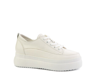 White classic leather trainers. Casual women's style. White lacing and white rubber soles. Isolated close-up on white background.