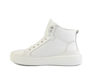 White classic leather trainers. Casual women's style. White lacing and white rubber soles. Isolated...