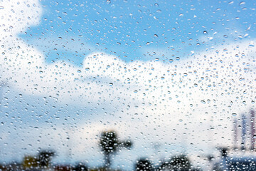 Looking through car windshield with rain drops. Background.
