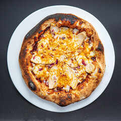 pizza on the black background, top view