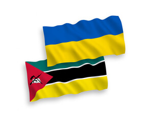 Flags of Republic of Mozambique and Ukraine on a white background