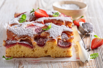 Homemade and delicious strawberry cake with fresh fruits and sugar.