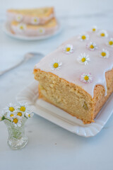 Fresh homemade lemon bundt cake decorated with white glaze
